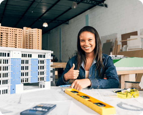 Image of a person with building models